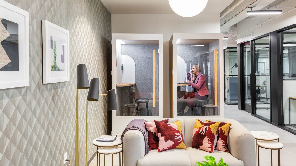 Private, soundproof phone booths allow team members to take calls without disturbing their colleagues.