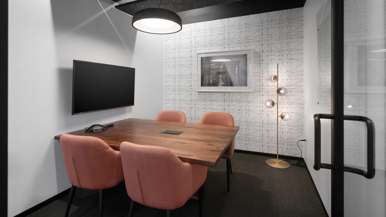 A conference room designed for small team meetings.