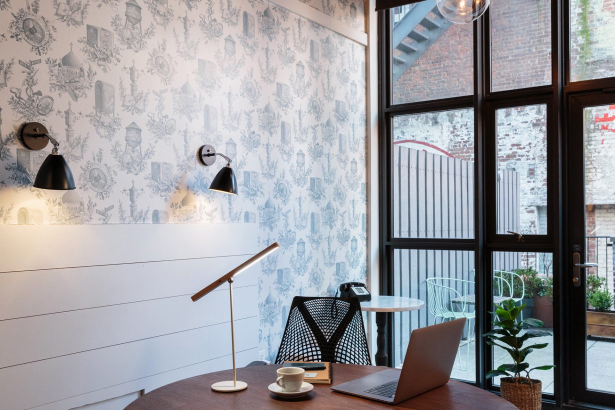 Members can look outside the window to spot some of the items in Wythe Toile, a modern twist on the traditional wallpaper created for the hotel.