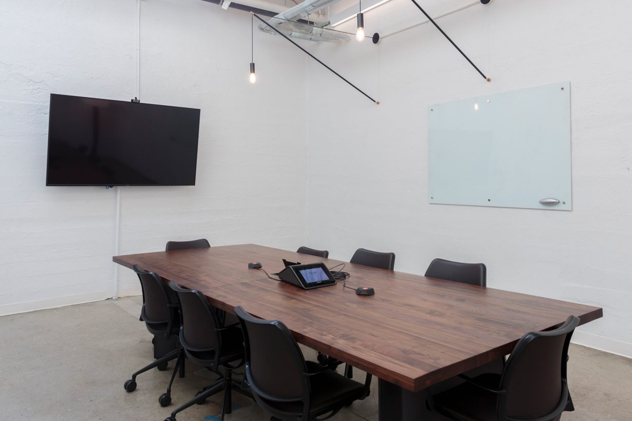Members can book conference rooms with A/V equipment, whiteboards, and other amenities.