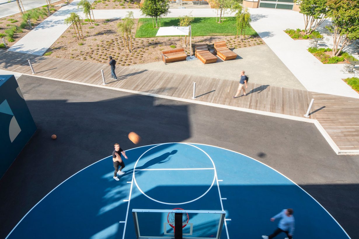 Outdoor activity centers include courts for volleyball, basketball, bocce ball, and pickleball.