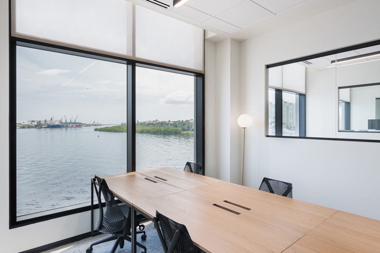 A conference room overlooks the waterfront.